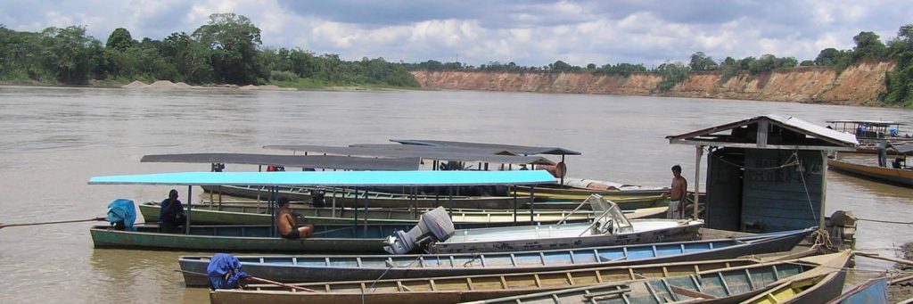 Traveling And The Risk Of Malaria In Kids, Boats on the Amazon River Traveling And The Risk Of Malaria In Kids, Boats on the Amazon River