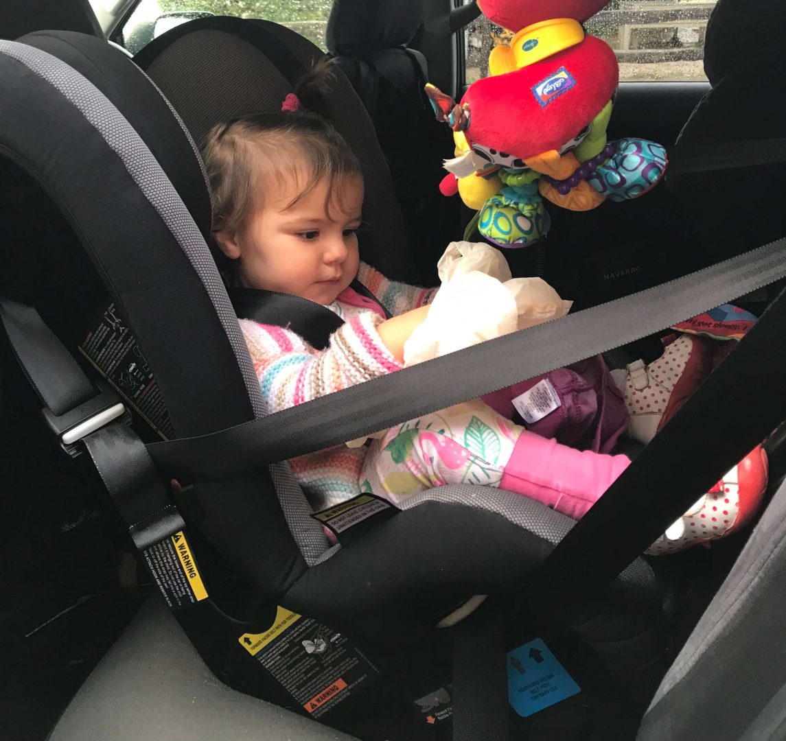 What to Pack for a Peru Family Holiday - girl in carseat