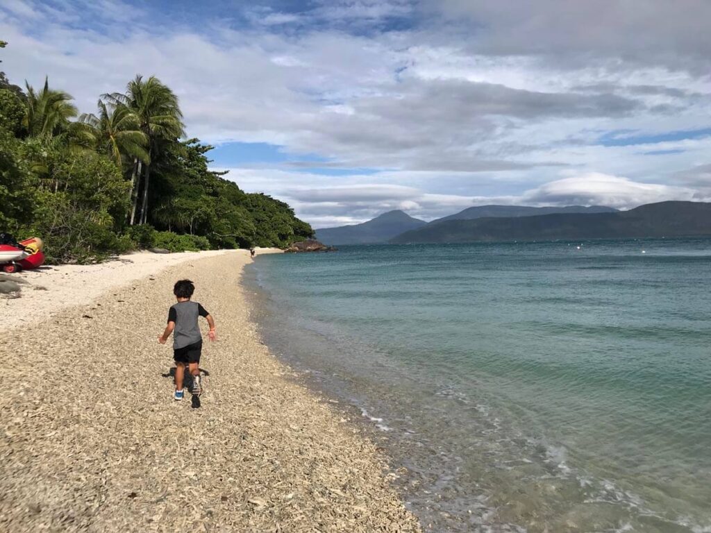 things to do at Fitzroy Island Australia, Fitzroy Island beaches, boy at Fitzroy Island things to do at Fitzroy Island Australia, Fitzroy Island beaches, boy at Fitzroy Island