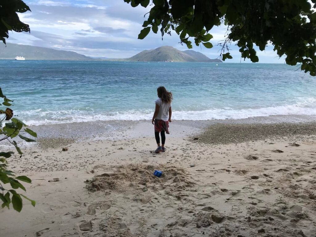 Fitzroy Island Accommodation, girl on beach at Fitzroy Island Australia
