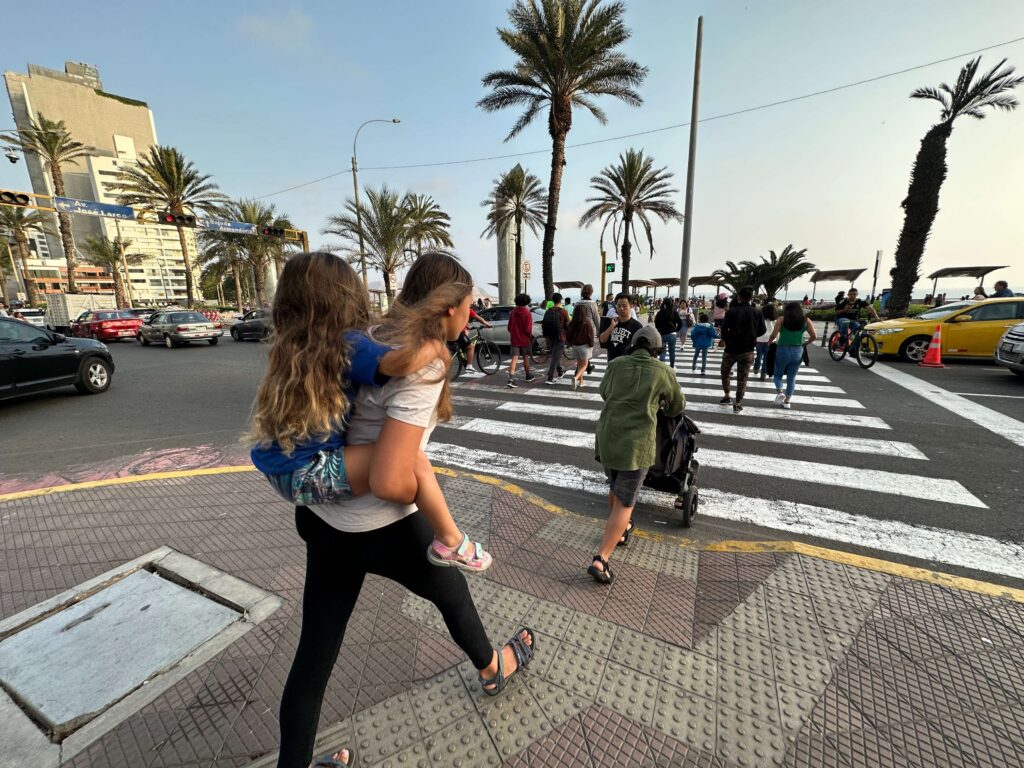 kids crossing the street in Lima